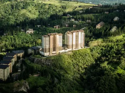 Stunning aerial view of residential buildings amidst lush greenery in Tagaytay, Philippines.
