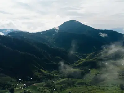 Aerial view of the lush green landscape surrounding Mount Apo, Davao City, Philippines.