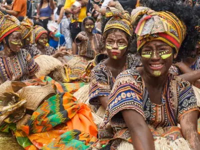 Vibrant celebration of the Dinagyang Festival featuring traditional costumes and tribal performances in Iloilo City, Philippines.