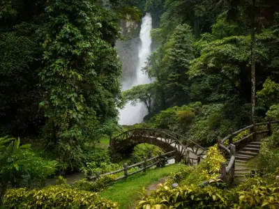 Discover the vibrant, lush scenery of a waterfall in Lake Sebu, Philippines.